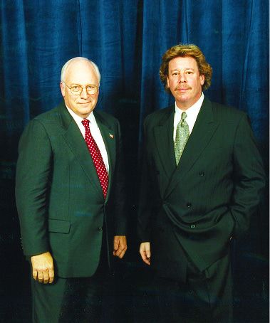 Michael Pollack with an associate in formal attire